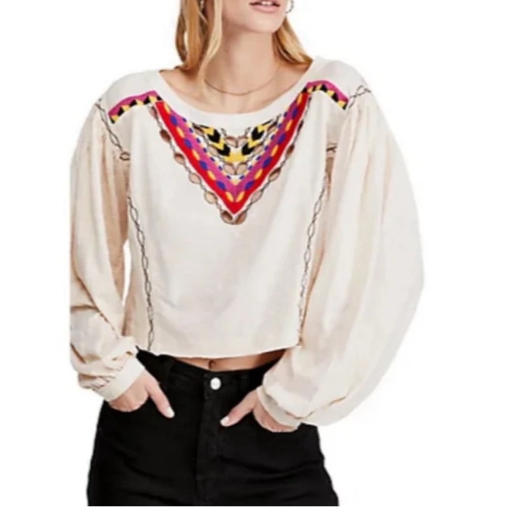 Free People embroidered blouse with eyelet details.
